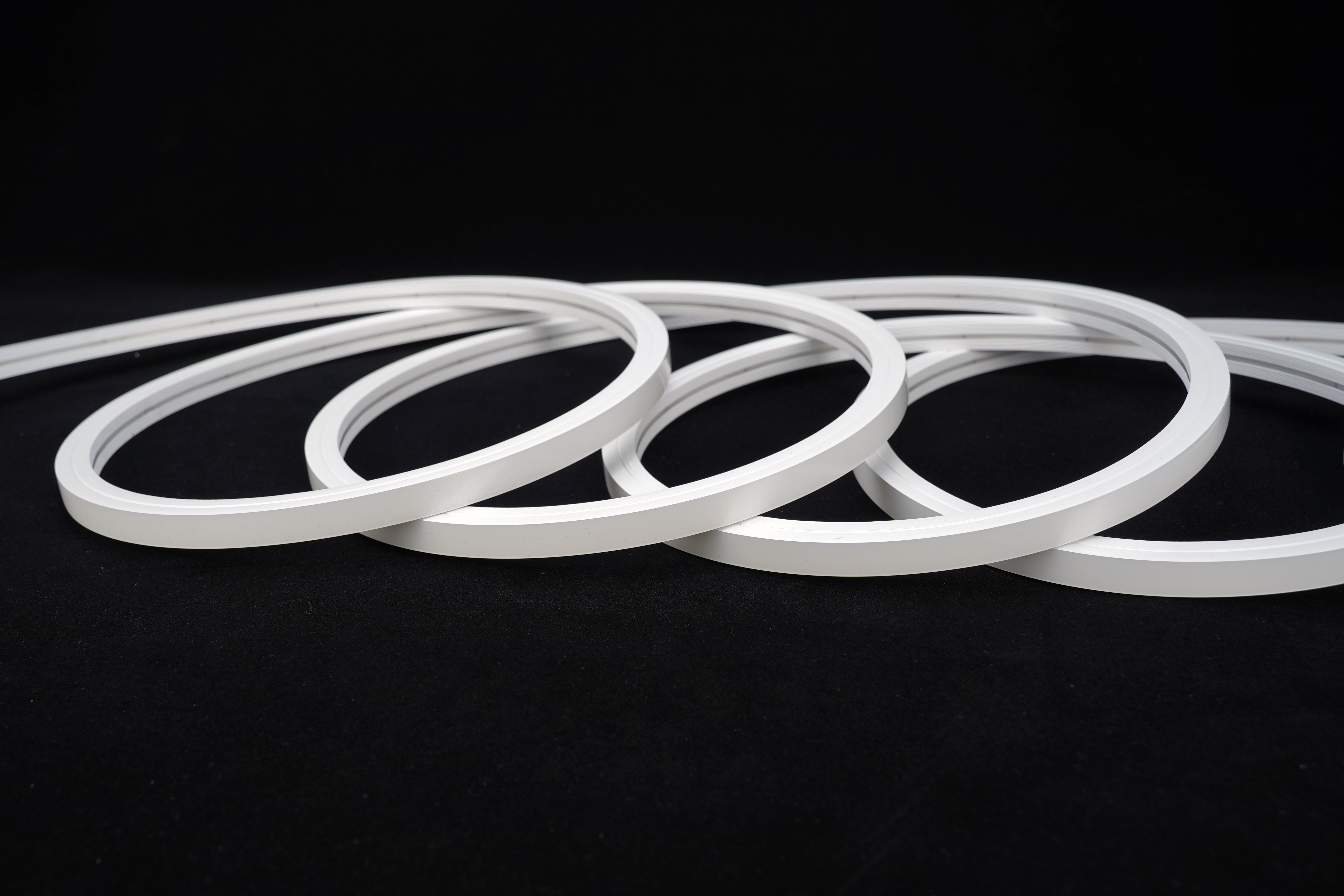 LED Neon Tube 12x12mm unbeleuchtet als 5m Rolle, flexibler Silikon Schlauch 24V IP67 Detailansicht