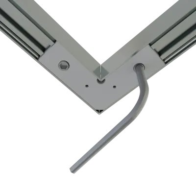 CON-A2 Verbinder 90° – Montierte Eckverbindung mit integrierter Kabelführung für LED-Aluminiumprofile CON-A2 Verbinder 90° – Nahaufnahme der montierten Innenecke mit Kabelführung durch den Eckverbinder, Draufsicht auf LED-Aluminiumprofil-Verbindung